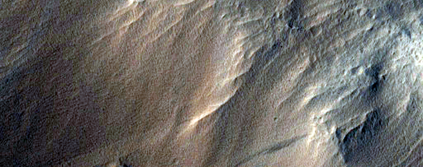Central Peak and Rim of 10-Kilometer Diameter Crater with Layered Ejecta