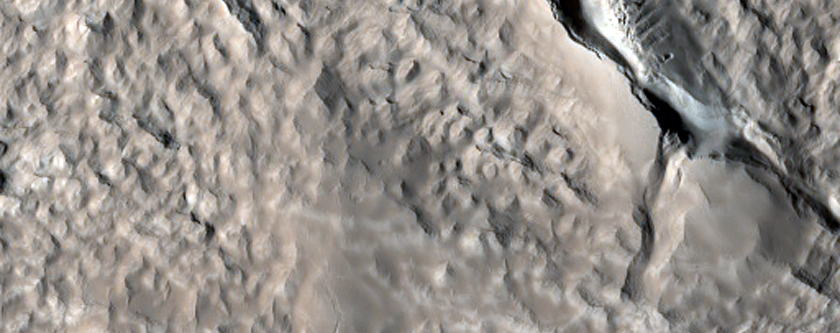 Depression West of the Auqakuh Vallis Terminus in Nilosyrtis Mensae