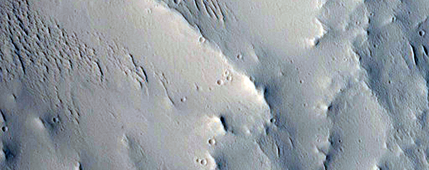 Well-Preserved 22-Kilometer Diameter Crater off Ascraeus Mons