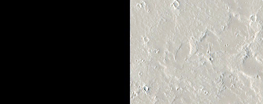 Cracked Tharsis Plain and Associated Channels
