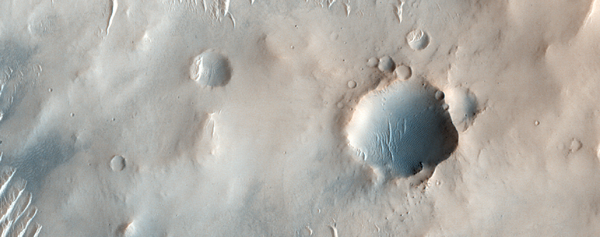 Pitted Materials in Bakhuysen Crater
