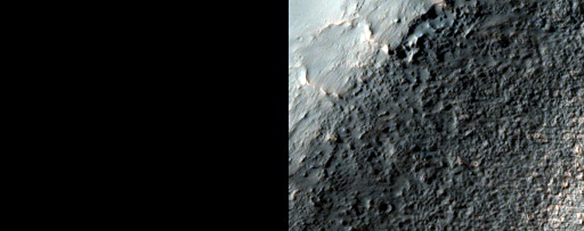 Massif and Apron Features in Promethei Terra