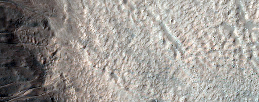 Volatiles and Gullies in Avire Crater