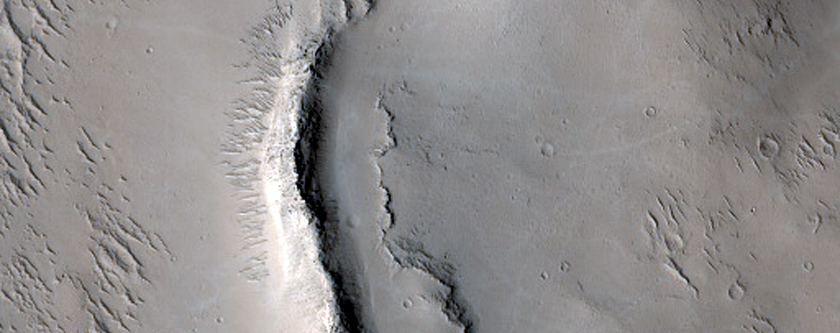 Contact between Lava Flow and Wrinkle Ridge in Tartarus Colles