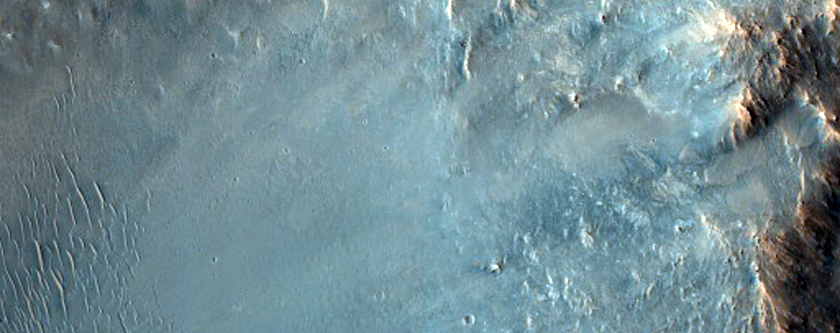 Impact Crater with Central Peak in Syrtis Major