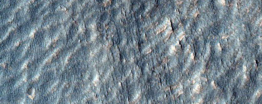 Tongue-Shaped Flow Feature on Mound East of Hellas Region