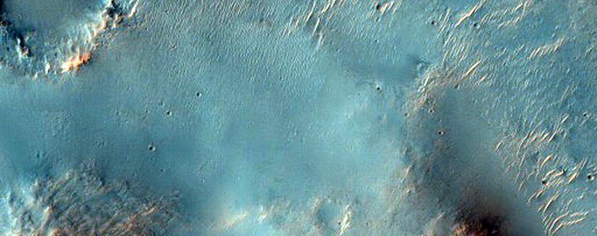 Possible Olivine-Rich Terrain North of Hellas Planitia