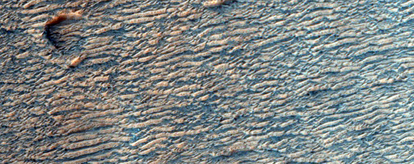 Possible Olivine-Rich Terrain North of Hellas Planitia
