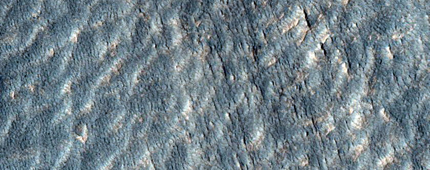 Tongue-Shaped Flow Feature on Mound near Hellas Region