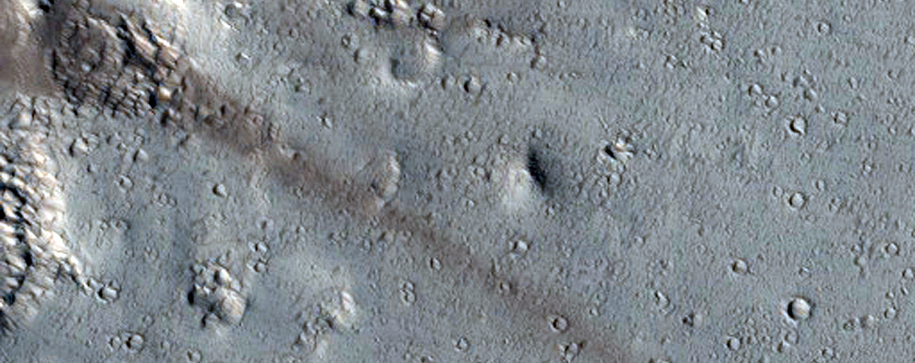 Well-Preserved 15-Kilometer Diameter Crater near Alba Mons