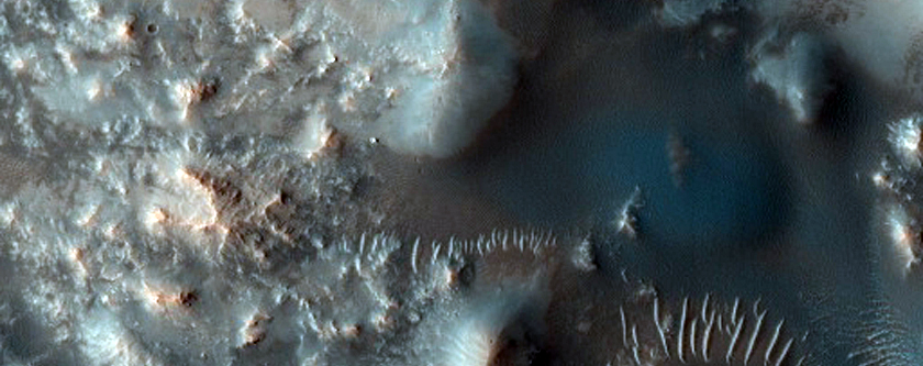 Well-Preserved 12-Kilometer Diameter Crater inside Madler Crater