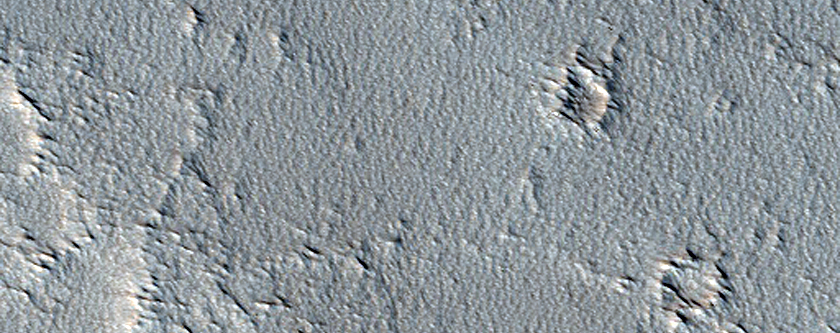 Candidate New Impact Site Formed between November 2004 and February 2010