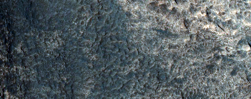 Pits Exposing Layered Bedrock