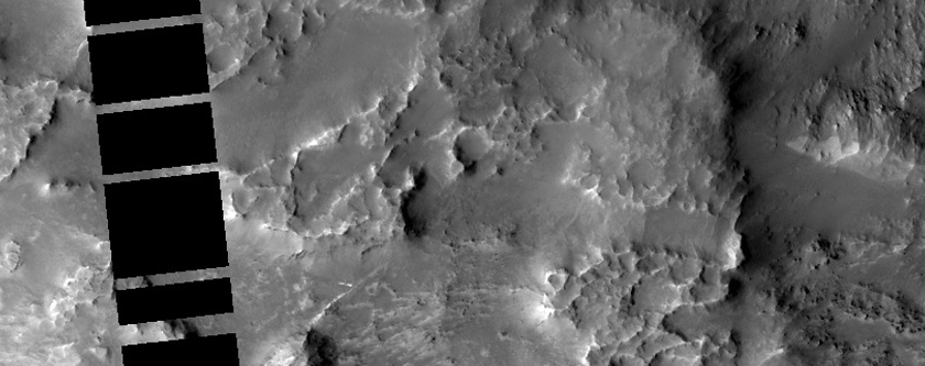 Possible Olivine-Rich Eroded Terrain in Northwest Hellas Region