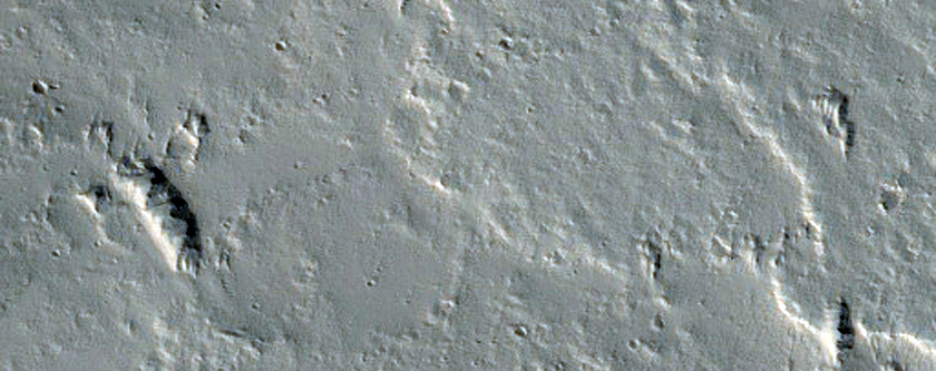 Dark Spot Indicating Possible Fresh Impact Site