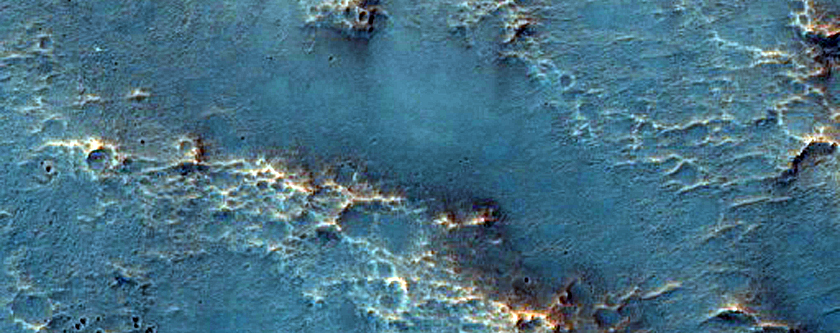 Possible Olivine-Rich Terrain North of Hellas Planitia