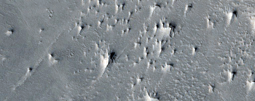 Faulted Layered Deposits in Capen Crater
