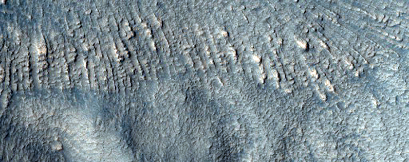 Central Structure of Large Impact Crater in Promethei Terra