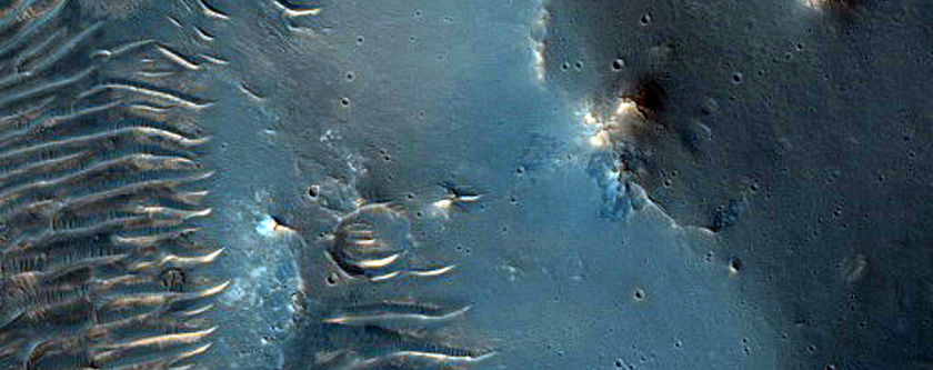 Well-Preserved Flow-Ejecta Crater East of Juventae Chasma