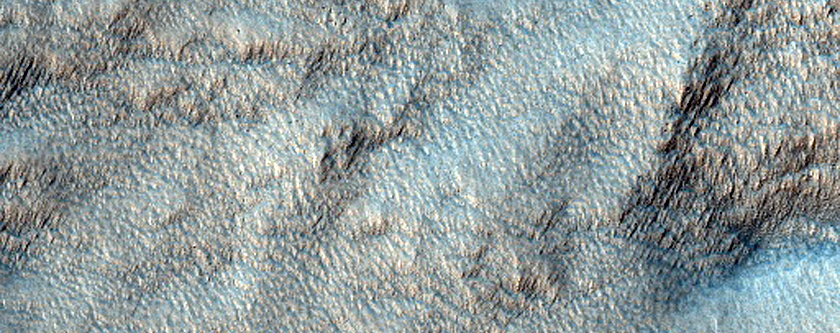 Pit with Layered Walls in Mid-Latitude Mantling Unit