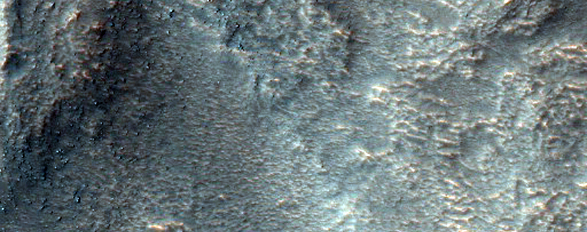 Impact Crater into Heavily Mantled Pole-Facing Slope