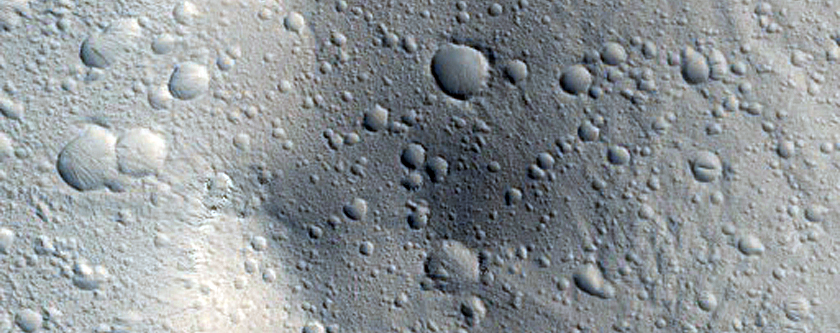 Crater Surrounded by Pyramidal and Elliptical Dome Hills