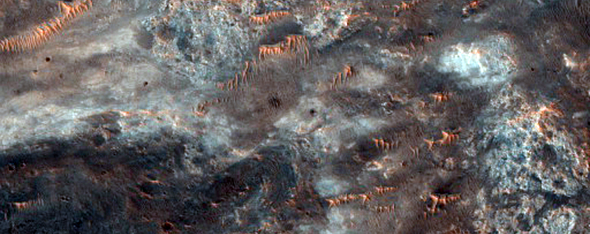 Light-Toned Material in Crater Ejecta Blanket