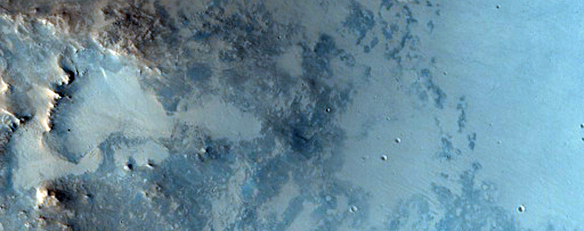 Crater with Rocky Central Structure in Syrtis Major Region