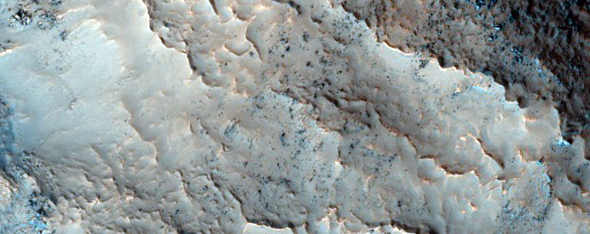 Ridges and Troughs in Valley on Rim of Moreux Crater