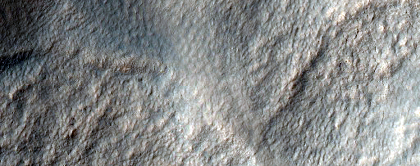 Disrupted Crater Rim next to Scarp