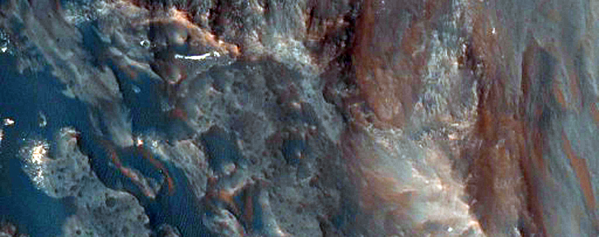 Light-Toned Material along Ridge in Coprates Chasma