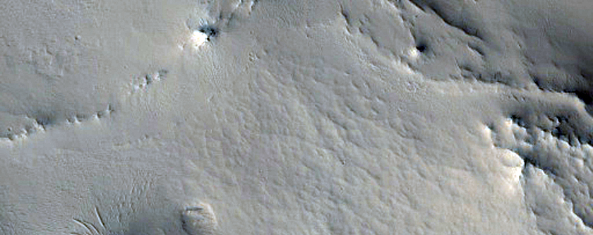 Sinuous Ridge Cut by Craters in Locras Valles Region