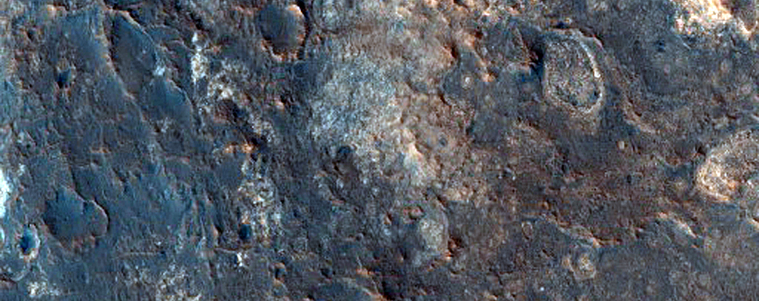 Light-Toned Outcrops near Crater Rim in Arabia Terra