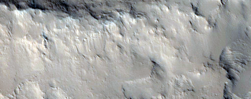 Layered Material in Crater Seen in CTX Image
