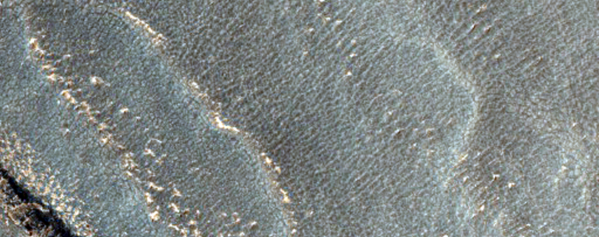Surfaces in a Crater in Hellas Montes Region