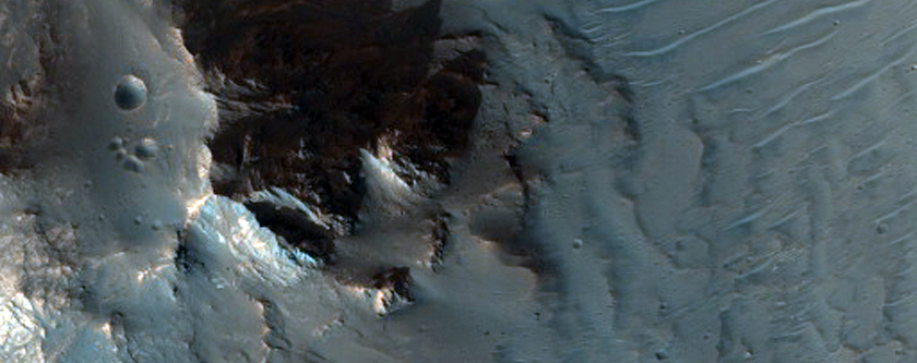 Bedrock Exposures in 20-Kilometer Diameter Crater in Kasei Valles
