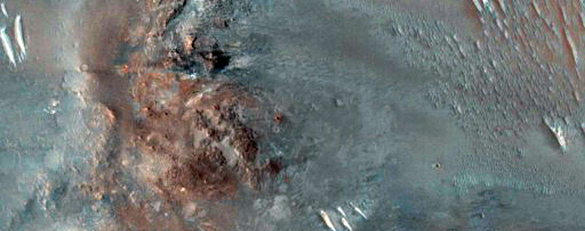 Possible Olivine-Rich Terrain in Libya Montes