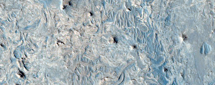 Layered Exposure at Edge of Meridiani Planum Seen in MOC E04-02489