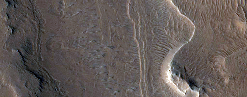 Terraced Mesas and Buttes in Trough Seen in MOC Image E10-00546