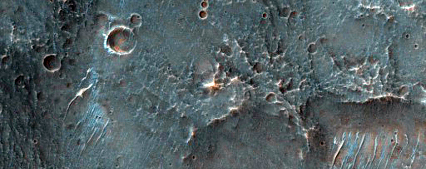 Olivine-Rich Crater and Plains in Thaumasia Planum