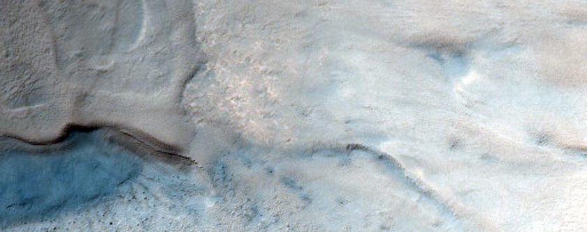 Crater with Material on Floor near Argentea Planum