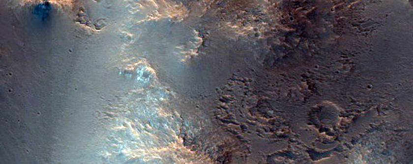 Bedrock Exposed in 60-Kilometer Crater East of Valles Marineris