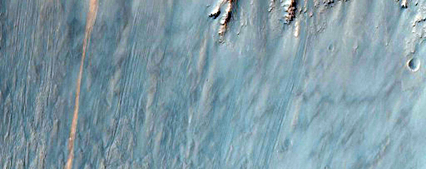 Light-Toned Material on Crater Wall