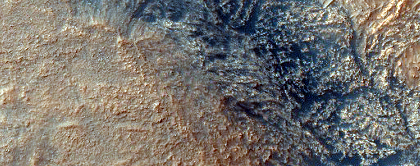 Clay-Bearing Layered Deposit in Unnamed Crater North of Proctor Crater