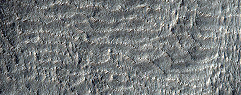 Possible Tongue-Shaped Flow Features in Terra Cimmeria