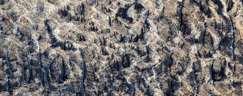 Light-Toned Deposit along Northern Melas Chasma Floor
