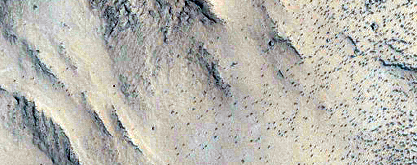 Deposit with Possible Layers in Crater in Arabia Region