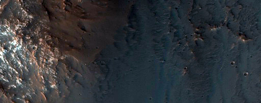Bedrock Exposures in 20-Kilometer Diameter Crater in Kasei Valles