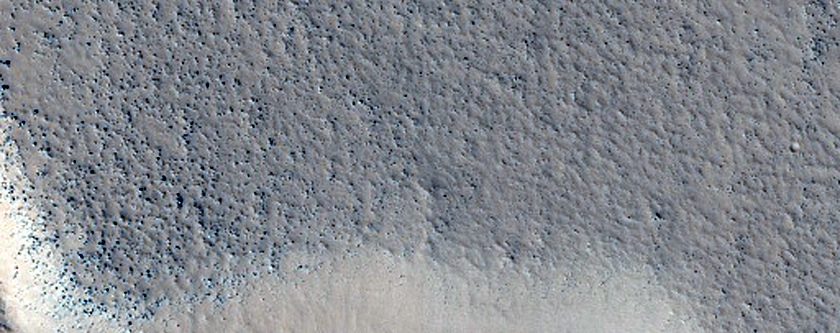 Tilted Layered Feature among Mesas in Southwest Utopia Planitia