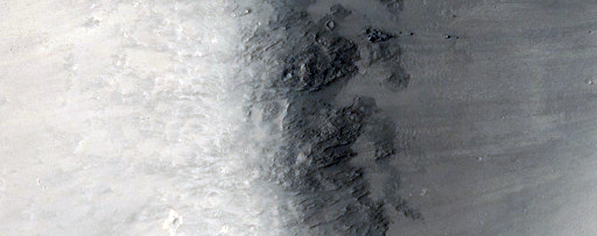 Possible Breach in Crater Rim By Source Tributary of Durius Valles